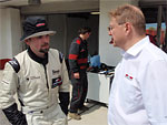 Petr Fulín is talking to Mr Karel Kubů, of the KplusK Motosport team