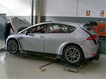 The wheel alignment of Michal Matějovský's SEAT León race car is being measured before the tests at Calafat