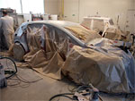 The car, in the JK Product company's paint shop
