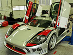 The overall view of the car SALEEN S7R in the workshop of K plus K motorsport