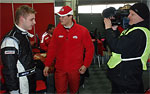 Racing drivers Michal Matějovský and Adam Lacko, in front of a TV camera