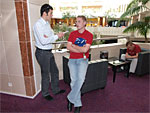 Michal Matějovský is giving an interview to one of the journalists in the Hilton Hotel