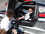 Father Zbignew Jan Czedlik tried the seat of the Saleen S7R car