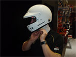 Michal Matějovský is trying a racing helmet of the new type.