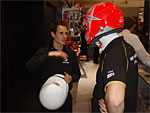 Assisted by Tim Sandtler, Michal Matějovský is trying the new helmet