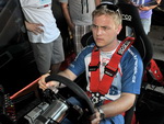 Michal Matějovský na motorsport-simulátoru fy Aqua Pro Racing