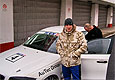 Jezdec Michal Matějovský s vozem BMW 130i na mosteckém okruhu