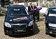 Ředitel společnosti Autoprofi Matějovský Dušan Šlechta seznamuje návštěvníky s novinkou - vozem Škoda Roomster