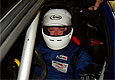 Šimon Kubišta v kokpitu vozu Alfa Romeo 156 S 2000